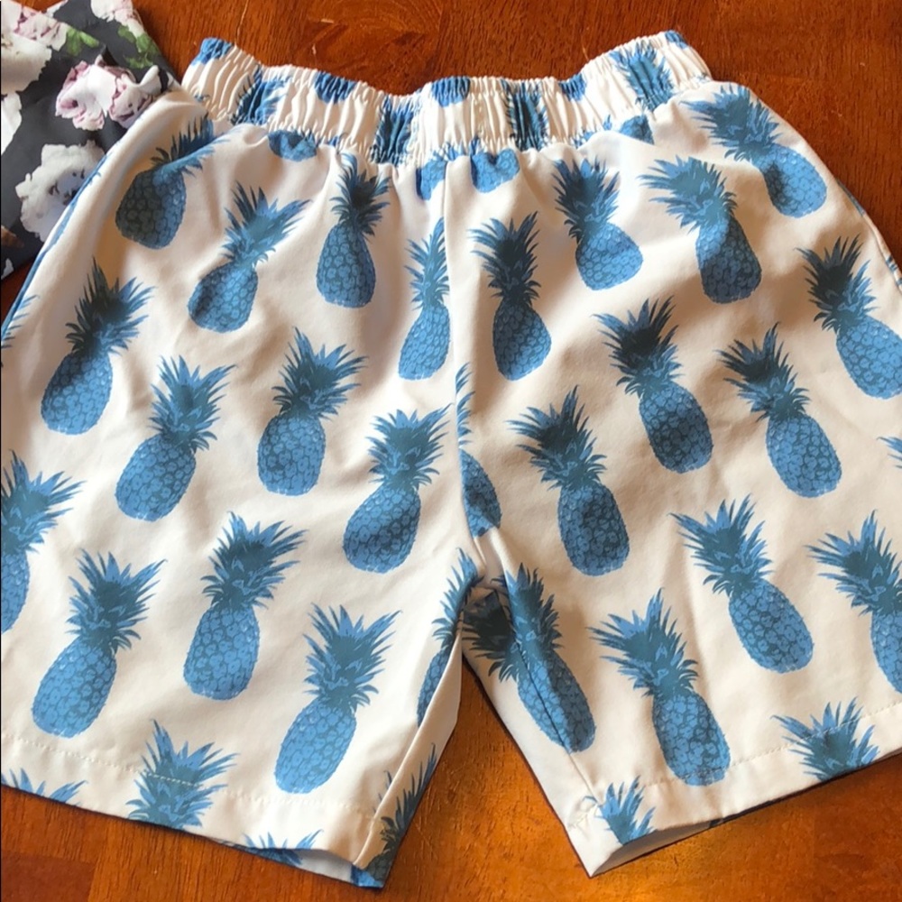 Kortni Jeane boys trunks. Blue Pineapple print.